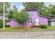 Charming two story home painted purple, with a dark roof and a well maintained yard and a small tree at 10 Cedarvilla Dr, Rock Hill, SC 29730