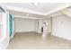 Open living room with white walls that leads to the kitchen and stairs at 10 Cedarvilla Dr, Rock Hill, SC 29730