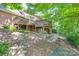 A spacious backyard featuring a multi-level deck and lush greenery, perfect for outdoor entertaining at 10215 Balmoral Cir, Charlotte, NC 28210