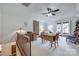 Lofted bonus room with vaulted ceilings, a ceiling fan, and multiple seating areas at 10215 Balmoral Cir, Charlotte, NC 28210