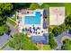 Aerial view of the community pool with lounge chairs and plenty of space to swim at 10215 Balmoral Cir, Charlotte, NC 28210
