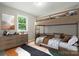 Cozy bedroom features a stylish bunk bed, dresser and abstract art on the wall at 107 S Branch St, Monroe, NC 28112
