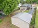 Bird's eye view displays the home with a garage, driveway, and well-maintained surrounding greenery at 1125 Bethel Rd, Charlotte, NC 28208