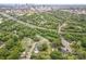 Stunning aerial view showcasing the neighborhood's lush greenery and convenient proximity to the city skyline at 1125 Bethel Rd, Charlotte, NC 28208