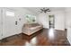 Spacious living room with neutral paint, hardwood flooring, and a comfortable sofa at 1125 Bethel Rd, Charlotte, NC 28208
