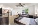 This living room features a full kitchen, sofa, and bed at 1125 Bethel Rd, Charlotte, NC 28208