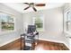 This office features hardwood floors, great natural light from the windows, and ample space for a desk at 1125 Bethel Rd, Charlotte, NC 28208