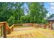 This is an inviting back deck space, perfect for relaxing with its natural wood finish and ample area at 1209 Rainbow Dr, Kannapolis, NC 28081