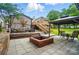 Enjoy a private backyard with a brick fire pit and a gazebo-covered patio area, perfect for entertaining guests at 1209 Rainbow Dr, Kannapolis, NC 28081