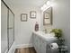 Updated bathroom with modern fixtures, walk-in shower, and stylish vanity at 1209 Rainbow Dr, Kannapolis, NC 28081