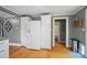 Bright kitchen features wooden floors and white appliances with gray walls at 1209 Rainbow Dr, Kannapolis, NC 28081