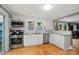 Modern kitchen with white cabinets, stainless steel appliances, and granite countertops at 1209 Rainbow Dr, Kannapolis, NC 28081