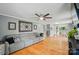 Spacious living room with hardwood floors and an open layout to dining and kitchen areas at 1209 Rainbow Dr, Kannapolis, NC 28081