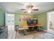 Bright office space with hardwood floors and a modern desk setup at 1209 Rainbow Dr, Kannapolis, NC 28081