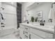 Stylish bathroom featuring double sinks, modern fixtures, and a shower-tub combination at 1217 Margo Mannor Dr, Fort Mill, SC 29708
