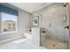 Elegant bathroom showcasing a soaking tub, walk-in shower and lots of natural light at 1217 Margo Mannor Dr, Fort Mill, SC 29708