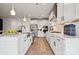 Modern kitchen features stainless steel appliances, white countertops, and sleek cabinetry at 1217 Margo Mannor Dr, Fort Mill, SC 29708