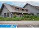Well-maintained building with designated scooter and golf cart parking near lush greenery at 1244 Weir Ct, Fort Mill, SC 29708