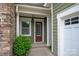 Charming front entrance with stone accents, leading to a welcoming foyer at 1244 Weir Ct, Fort Mill, SC 29708