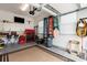 Organized garage with workbench, tool storage and epoxy flooring at 1244 Weir Ct, Fort Mill, SC 29708