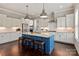 Bright, open kitchen featuring a center island with seating and stainless steel appliances at 1244 Weir Ct, Fort Mill, SC 29708