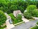 Charming suburban home with manicured lawn, lush trees, and inviting curb appeal in a Gathering-friendly neighborhood at 147 Whitley Mills Rd, Fort Mill, SC 29708