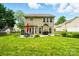 Expansive backyard featuring a patio, outdoor furniture, and lush green lawn at 147 Whitley Mills Rd, Fort Mill, SC 29708