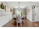 Elegant dining room featuring a large table, comfortable seating, and stylish decor at 147 Whitley Mills Rd, Fort Mill, SC 29708