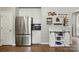 Kitchen featuring stainless appliances, granite counters, white cabinets and a charming 'Coffee' themed decor at 147 Whitley Mills Rd, Fort Mill, SC 29708