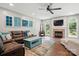 Cozy living room with a fireplace, comfortable seating, and modern decor at 147 Whitley Mills Rd, Fort Mill, SC 29708