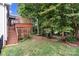 Multi-tiered deck and landscaped backyard offering a serene outdoor retreat at 1525 Valhalla Dr, Denver, NC 28037