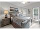 Bedroom showcasing a well-lit room with a ceiling fan and a beautifully decorated bed at 1525 Valhalla Dr, Denver, NC 28037