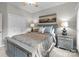 Bedroom featuring a large bed with nightstands and plenty of natural light at 1525 Valhalla Dr, Denver, NC 28037