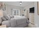 Bedroom with a white writing desk and a large window for plenty of natural light at 1525 Valhalla Dr, Denver, NC 28037
