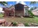 Back of home showcasing multi-level decks and covered porch at 1525 Valhalla Dr, Denver, NC 28037