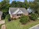 A beautiful house with brick exterior, shutters, and landscaping at 1525 Valhalla Dr, Denver, NC 28037