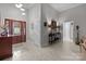 Elegant foyer with wood-look tile flooring and a grand front door with leaded glass at 1525 Valhalla Dr, Denver, NC 28037