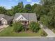 Charming brick home with a manicured lawn, lush landscaping and inviting curb appeal at 1525 Valhalla Dr, Denver, NC 28037