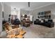 Open-concept living room showcasing stylish furnishings, decor, and modern design elements at 1525 Valhalla Dr, Denver, NC 28037