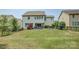 Spacious backyard features a lawn, patio and fence for outdoor enjoyment and privacy at 15344 Cimarron Hills Ln, Charlotte, NC 28278