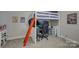Bedroom complete with a loft bed and a cozy study nook for an efficient space-saving design at 15344 Cimarron Hills Ln, Charlotte, NC 28278