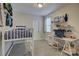 Bright bedroom with desk, shelves, and bed, creating a perfect space for rest and study at 15344 Cimarron Hills Ln, Charlotte, NC 28278