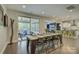 Open concept dining area connecting to the kitchen and featuring outdoor access at 15344 Cimarron Hills Ln, Charlotte, NC 28278