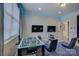 Inviting game room with blue LED accent lights, foosball table, and seating area at 15344 Cimarron Hills Ln, Charlotte, NC 28278