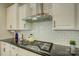 Well-equipped kitchen featuring stainless steel appliances and white subway tile backsplash at 15344 Cimarron Hills Ln, Charlotte, NC 28278
