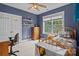 Inviting bedroom with a view, study desk, and shelving at 154 Hunters Hill Dr, Statesville, NC 28677