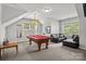 Spacious game room with a pool table and comfortable seating at 154 Hunters Hill Dr, Statesville, NC 28677
