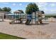 A colorful playground includes slides and climbing areas, adjacent to a community pool with a secure fence and plenty of space at 154 Hunters Hill Dr, Statesville, NC 28677