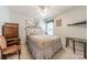 Comfortable bedroom with carpet, ceiling fan, and lots of natural light at 199 Ashmont Dr, Kannapolis, NC 28081