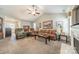 Spacious living room featuring high ceilings, a ceiling fan, and plush carpeting at 199 Ashmont Dr, Kannapolis, NC 28081